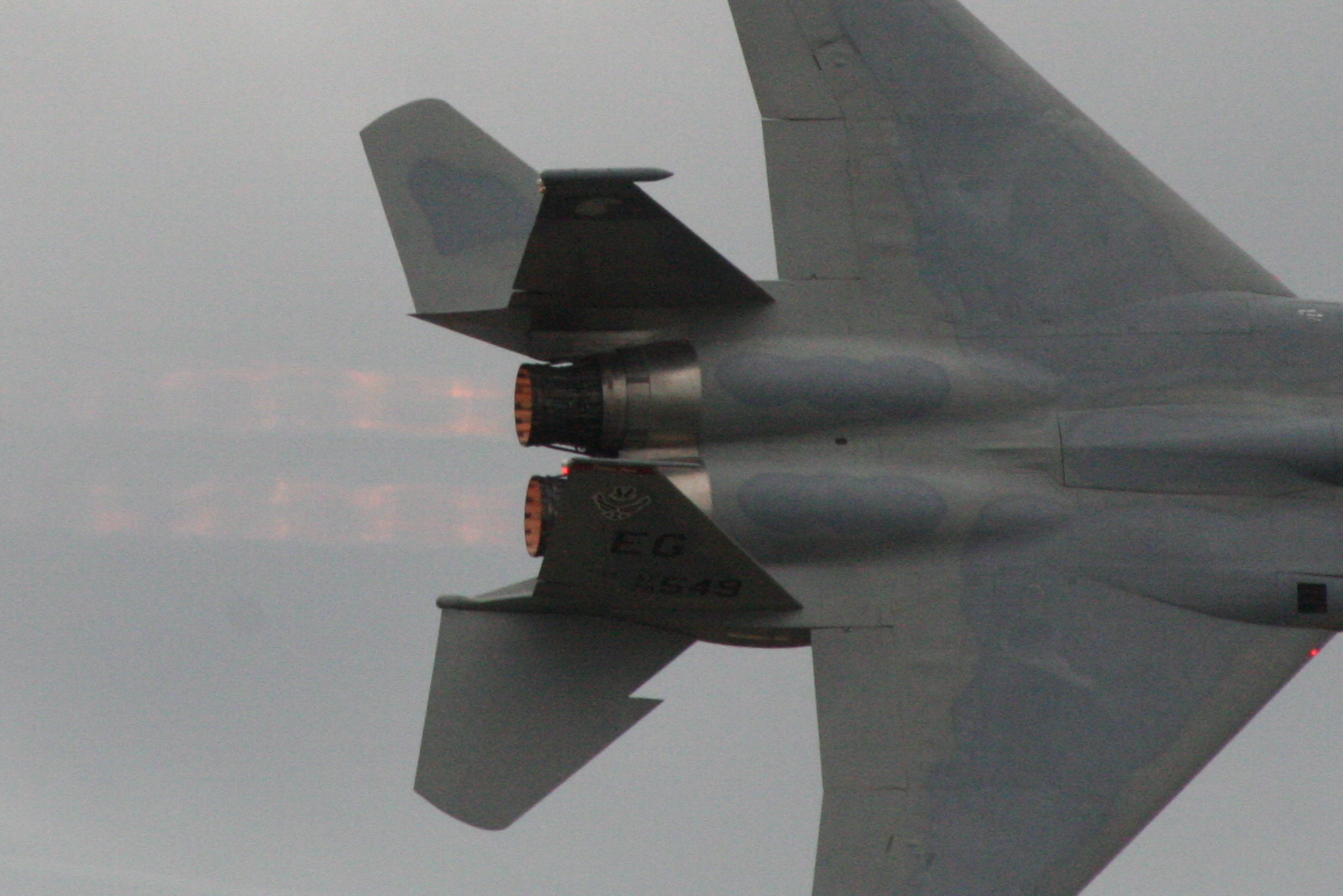 An F-15 jet's afterburners mid-flight
